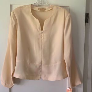 NEW with tags from Nordstrom’s. Long sleeve ivory top with zipper front. Size 16